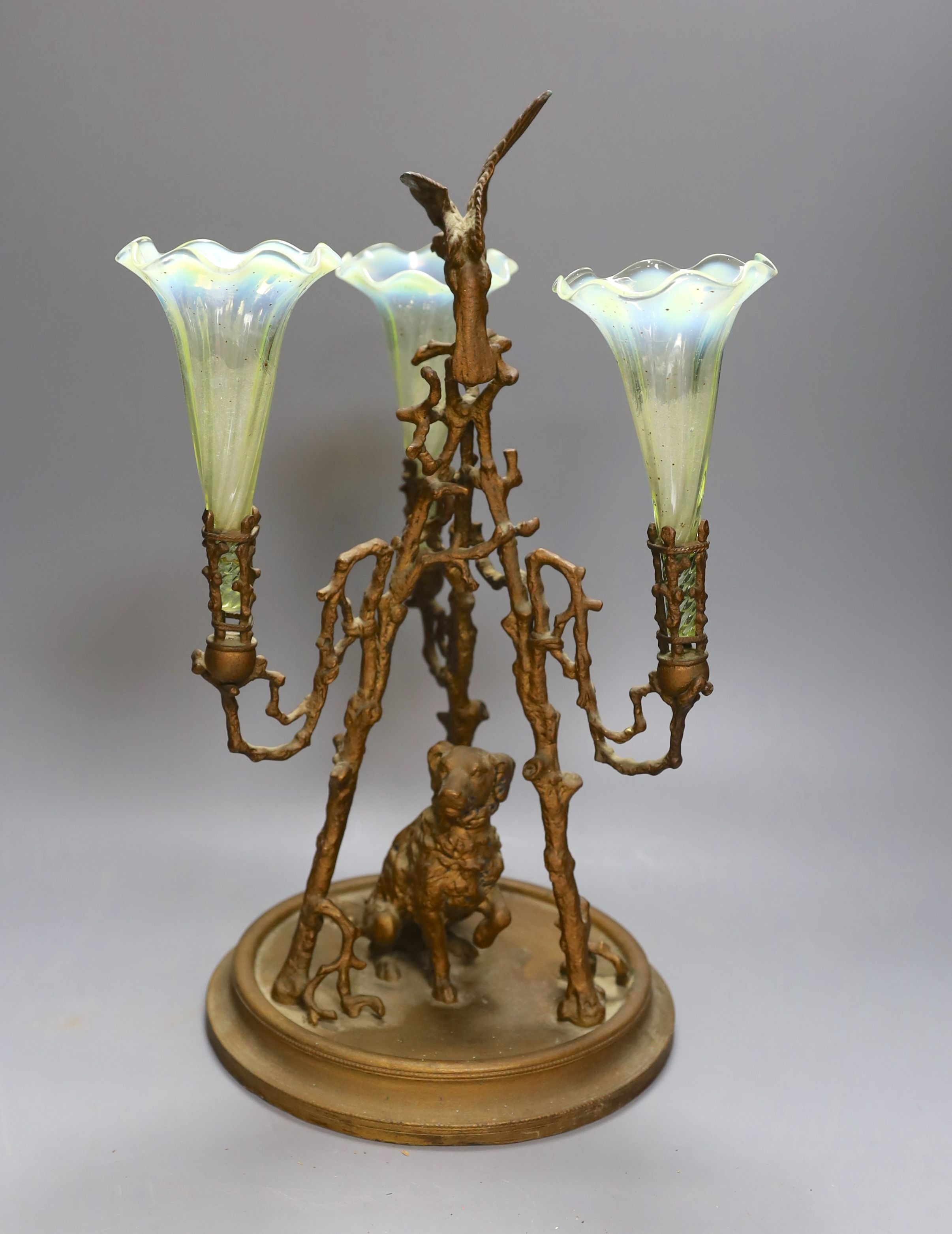 A 19th century 3 branch and spelter epergne decorated with a dog and bird - 41cm tall, with Vaseline glass vases